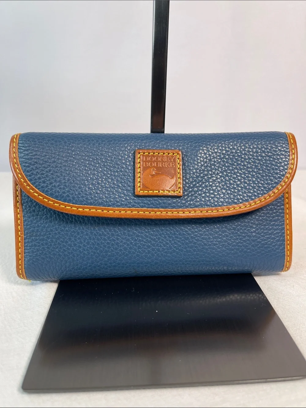 Dooney & Bourke Continental Clutch Blue Pebbled Leather Wallet